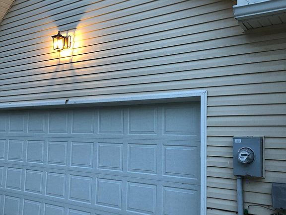 Two car garage with shared
Drive. Patio on the east side of the garage for privacy and steps to the Monon. Great for chilling and grilling.