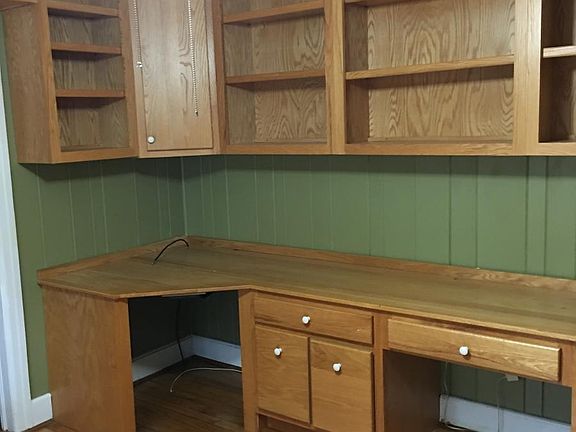 Separate study with oak cabinets