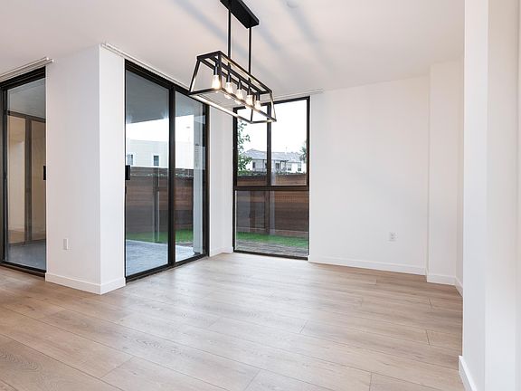 Dining area, new lighitng, with access to the patio and living room.