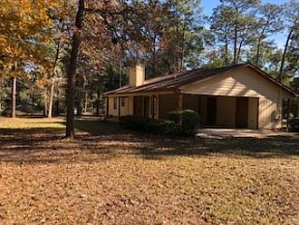Carport with Storage Room