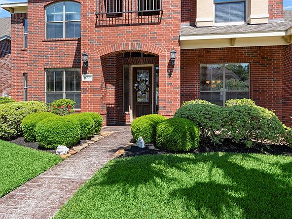 Lovely covered porch area greets and your guests.