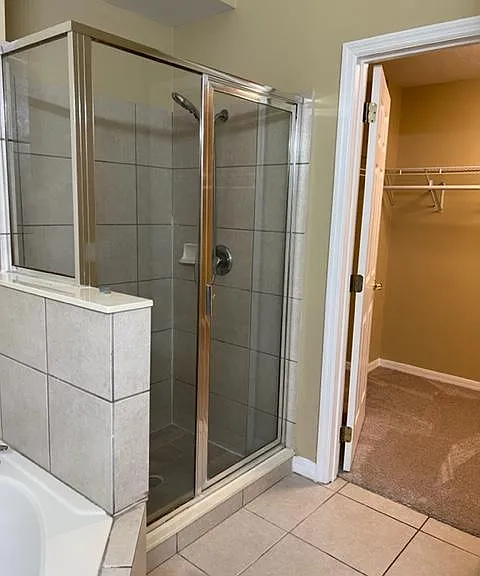 Master bath towards large walk-in closet