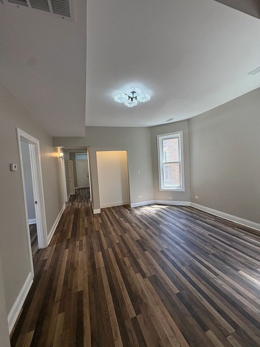 Building Photo - 6741 S Emerald Ave #3