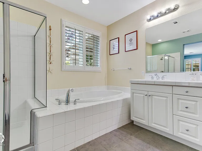 Walk-in shower and separate tub