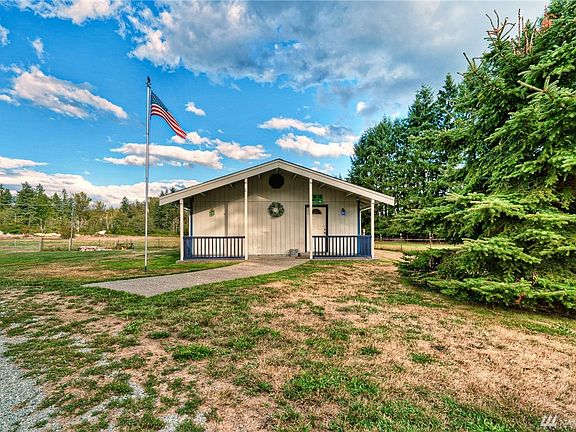 Welcome home!  This adorable 1295 square foot single-level home offers a covered front porch, entry bonus room, utility, 2 spacious bedrooms, 1.5 baths, kitchen with dining space and living room.  Plus, the living and dining space overlook the covered front deck with Mt. Rainier views!