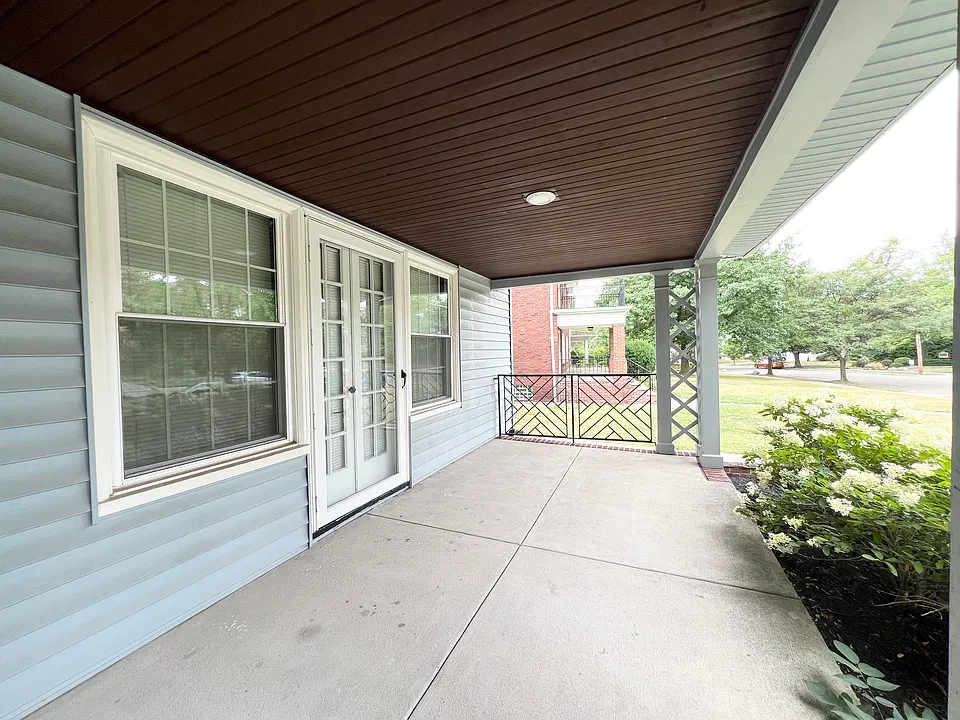 The front porch belongs to the apartment unit