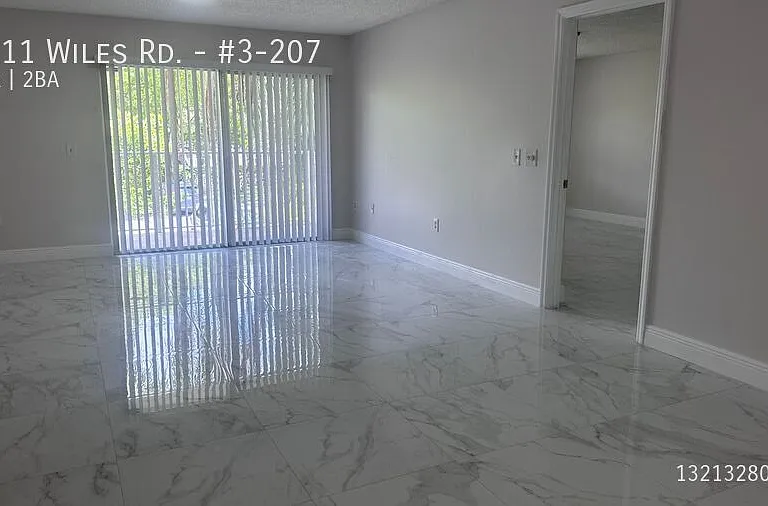 5011 Wiles Rd #3-207 — Photo 23