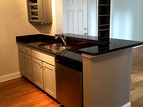 Hardwood floors throughout unit's 1st floor