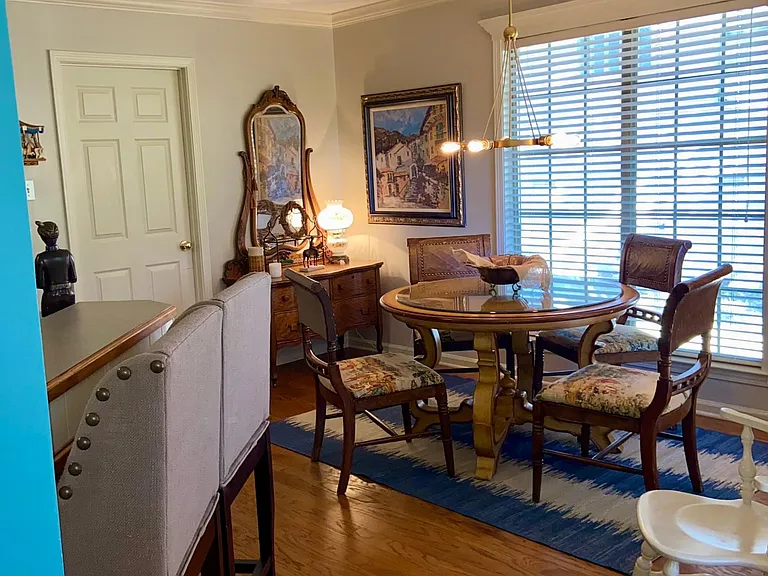Eat In Kitchen with Laundry room and deck leading to backyard off of it.