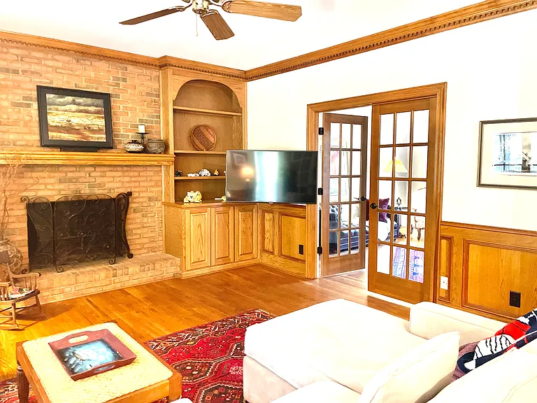 Family room with doors to living room