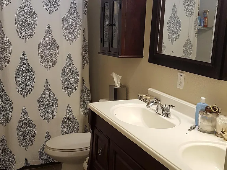 Bathroom upstairs. In between two bedrooms.