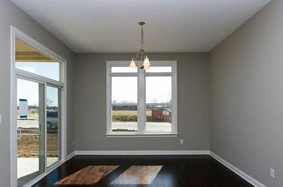 Formal dining area with hardwood floors