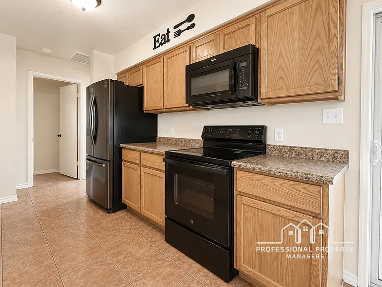 7042 E 36th Pl — Photo 5