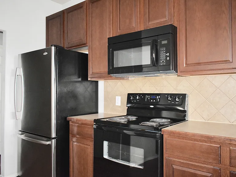 Black Appliances including Refrigerator