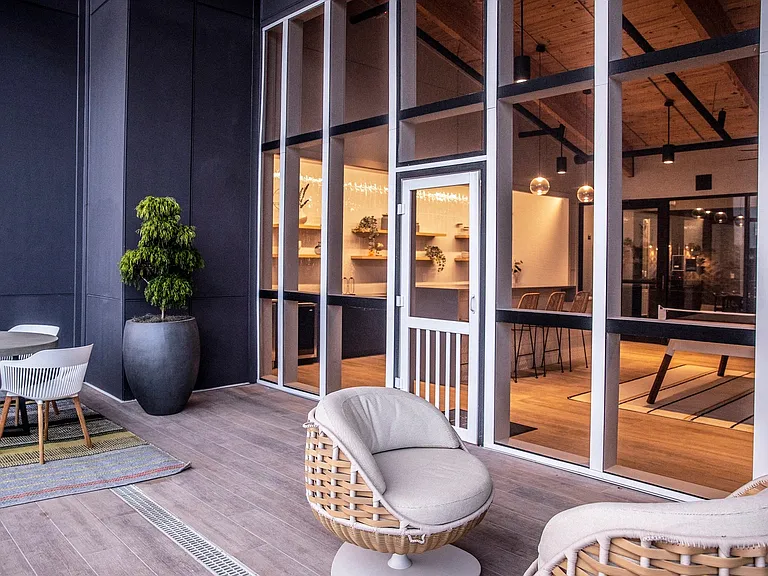 The rooftop veranda is complete with comfortable seating.