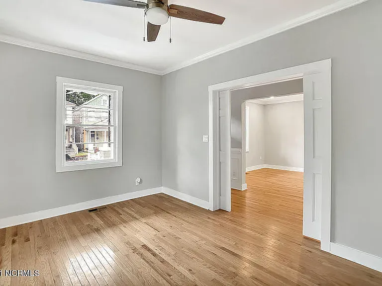 *original listing photo from when we purchased the home (downstairs bedroom #1)