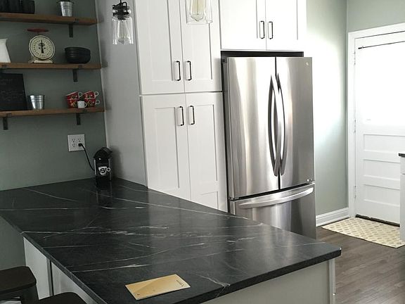 newly remodeled kitchen with soapstone counters