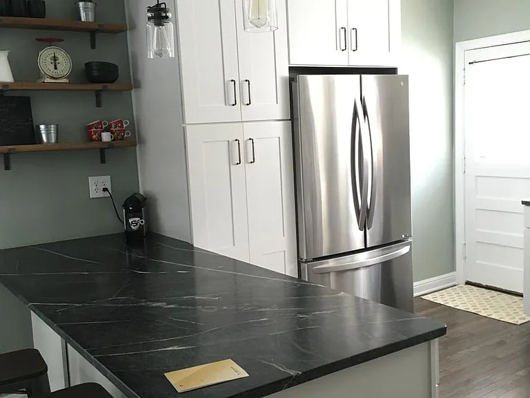 newly remodeled kitchen with soapstone counters