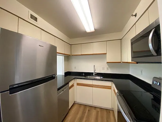 Updated kitchen with high-end appliances and granite.