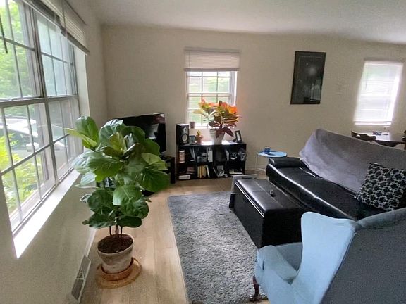 Living room with lots of windows.