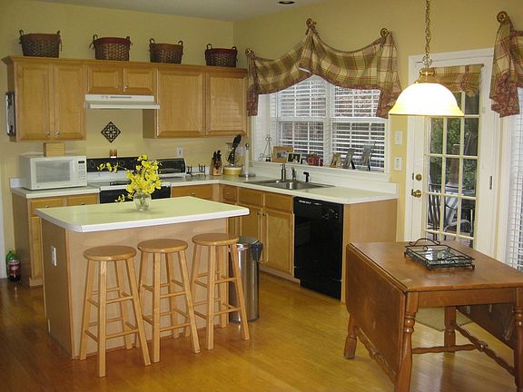 Kitchen with partial view of breakfast nook