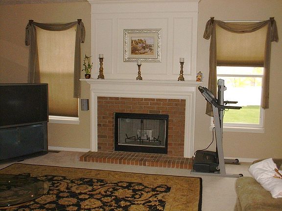 Cozy Family Room with woodburning fireplace