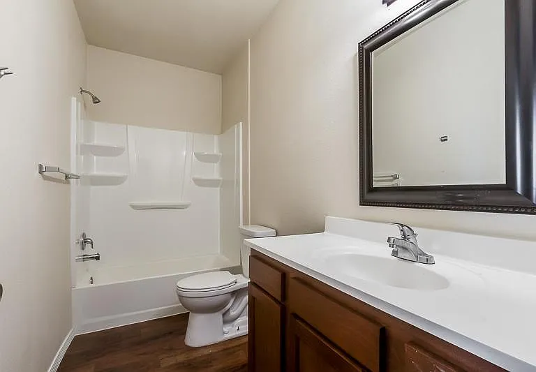 All bathrooms have similar finishes, the layouts vary somewhat.
