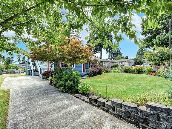 Professionally landscaped corner lot.