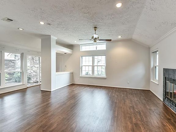 Brand new high end laminate wood flooring just installed. Windows throughout make it light and bright.