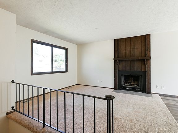 Living Room Open to Dining Area and Kitchen