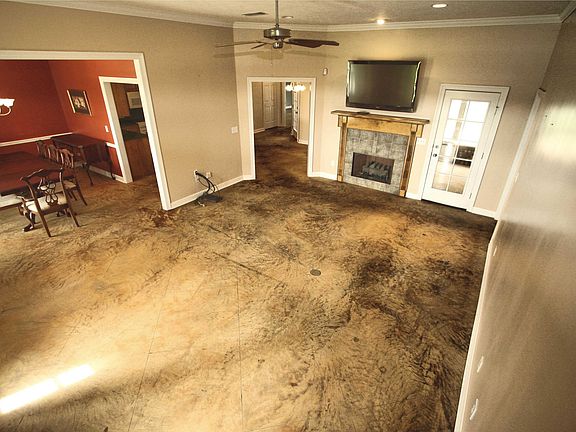 Brick steps lead to the expansive front porch.