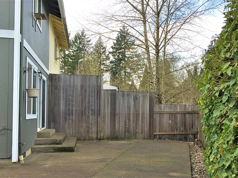 Private backyard with a patio