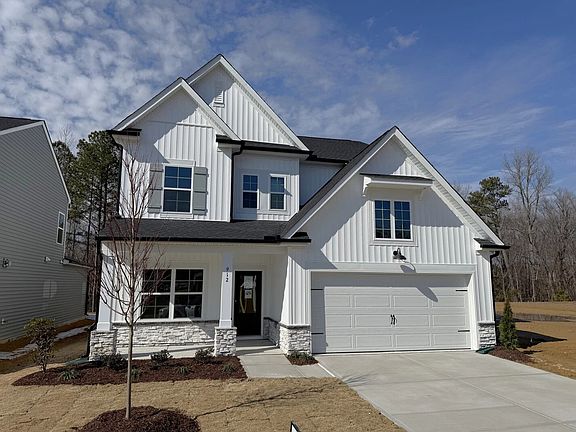 Exterior - Classic siding and a breezy coastal palette.