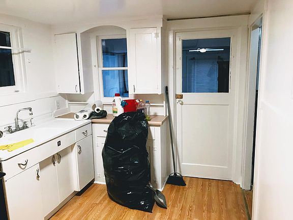 Door to utility/laundry room.