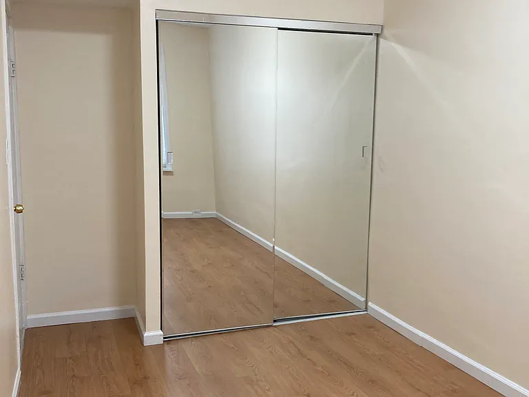 Bedroom 1 (Built in closet with mirror)