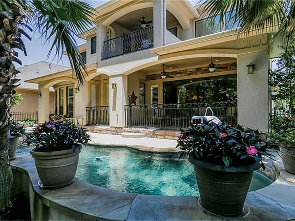Backyard Retreat is Easily Accessible from Multiple Doors. Complete with Outdoor Shower.
