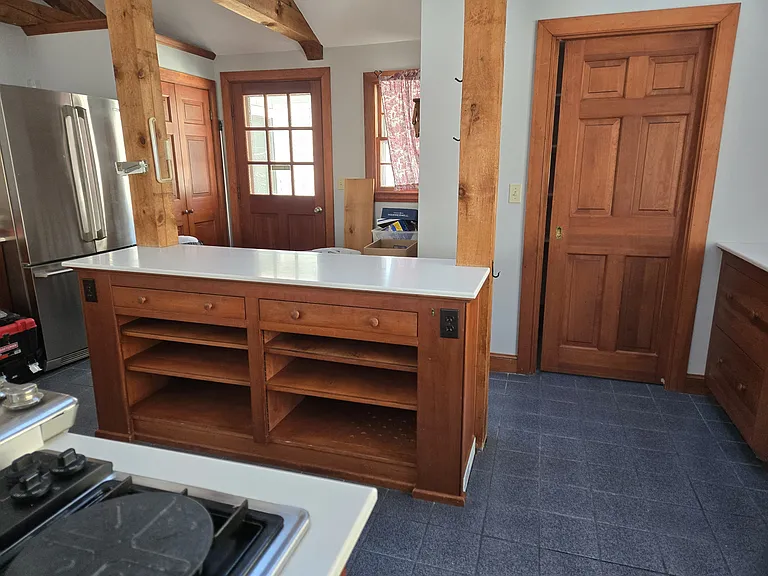 additional island, door leads to pantry
