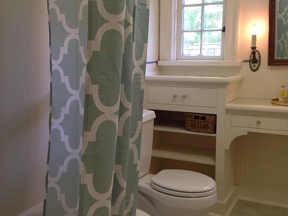 Charming full bath with built in vanity