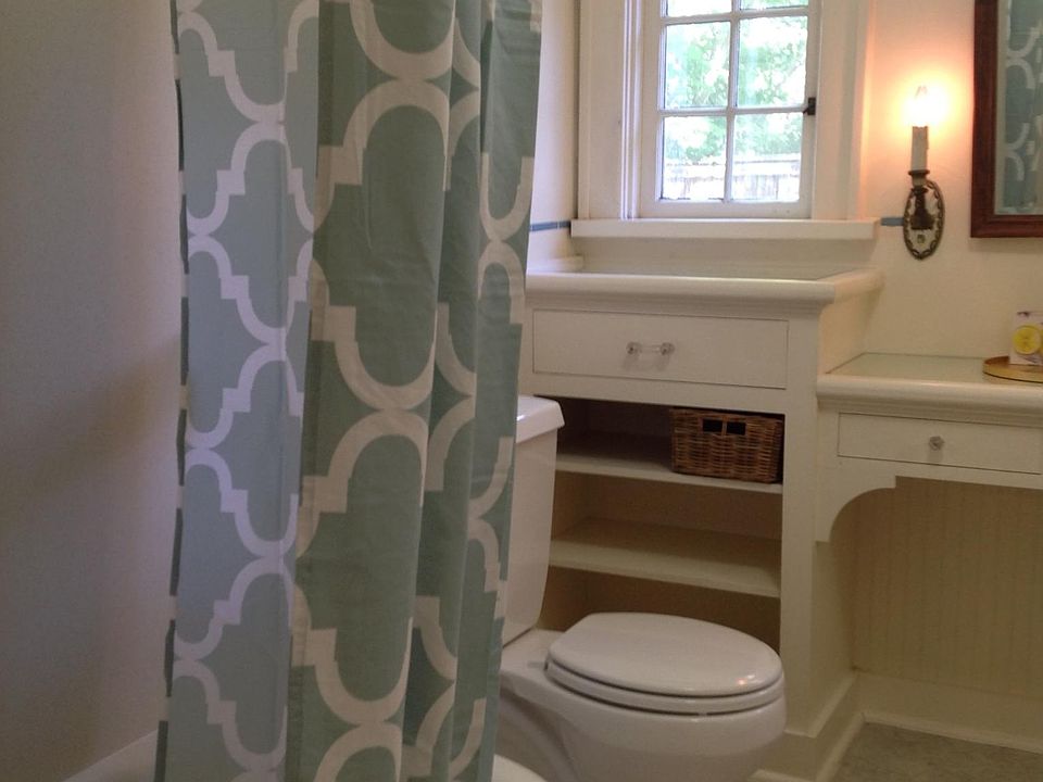 Charming full bath with built in vanity