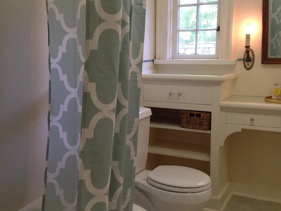 Charming full bath with built in vanity