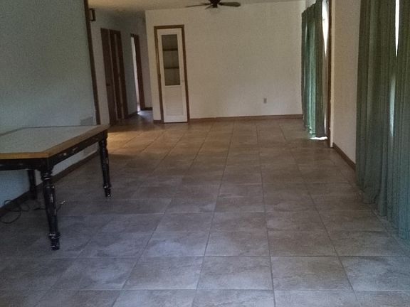 Open floor plan, Large living room/dining room. Older pic, Has furniture now.