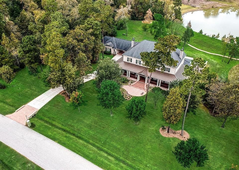 Rare 2.4 Acre Lakefront Custom Luxury Estate. Premium location in the beautiful Community of Benders Landing Estates.