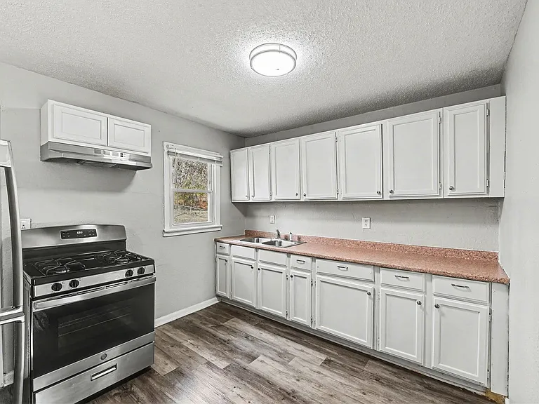 7036 Bellefontaine Ave — Photo 1