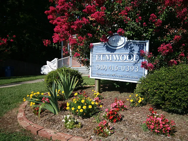 Private carport, in-unit laundry, and the Lakewood strip right outside your door. — Photo 17