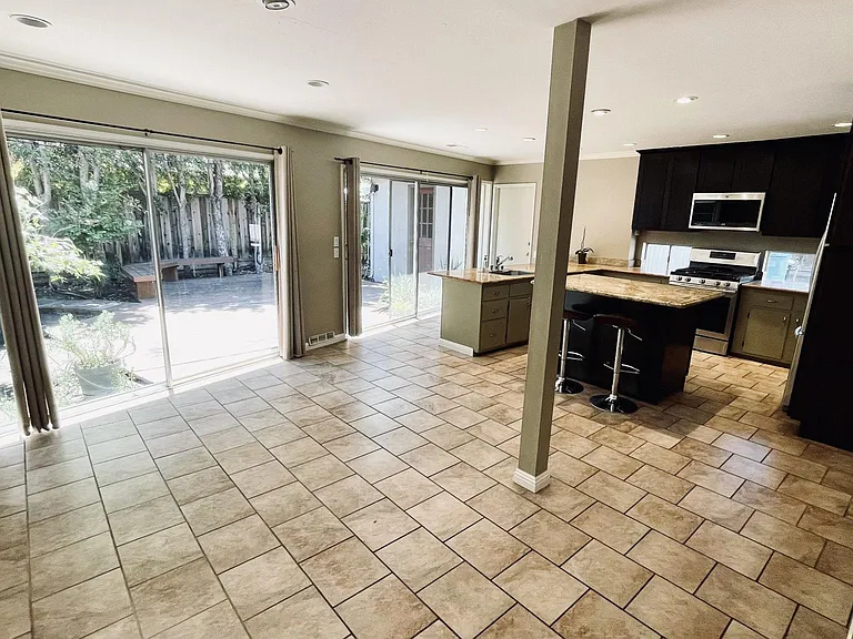 Open floor plan with kitchen and family room