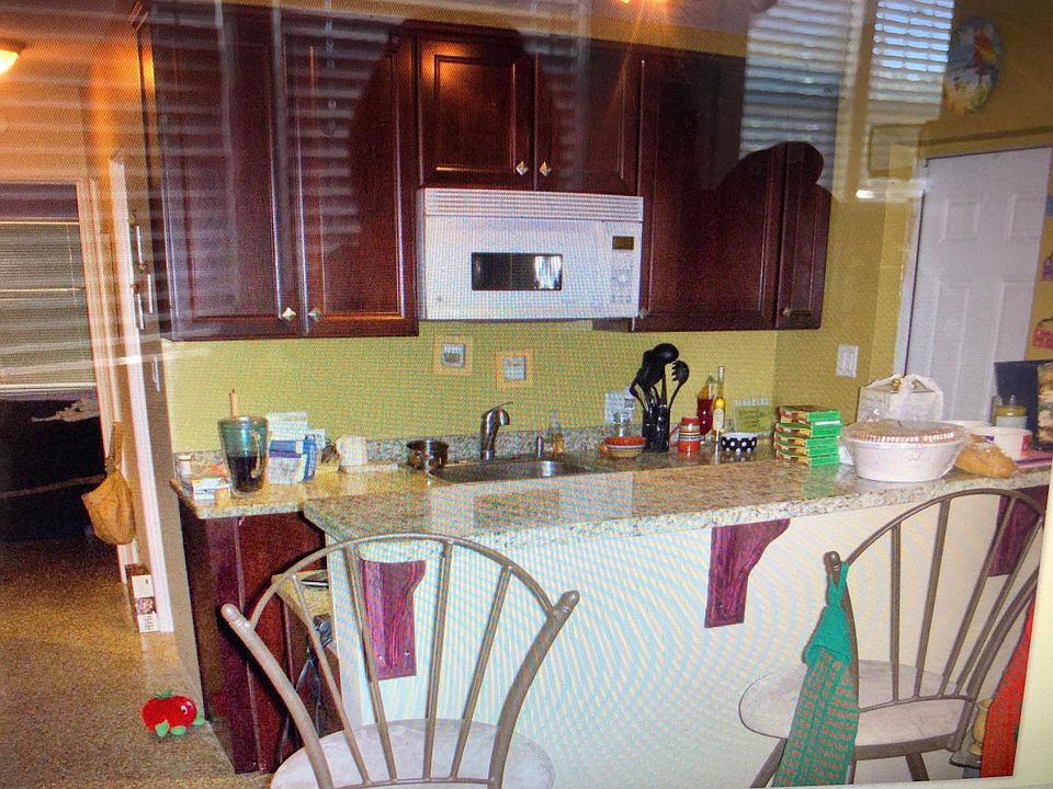 Kitchen with high bar