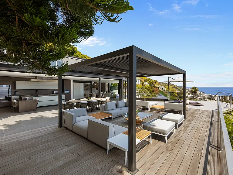 Whether for morning coffee or evening cocktails, the loggia offers a perfect retreat.