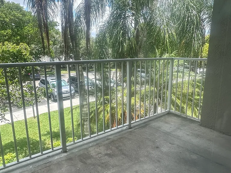 5011 Wiles Rd #207 — Photo 29