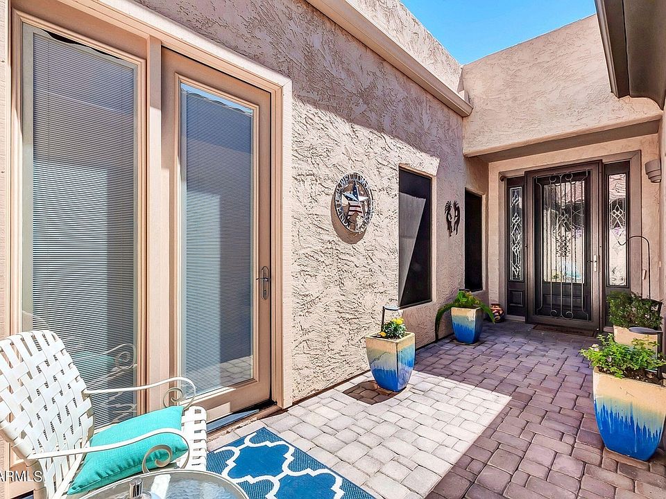 front courtyard with screened security front door