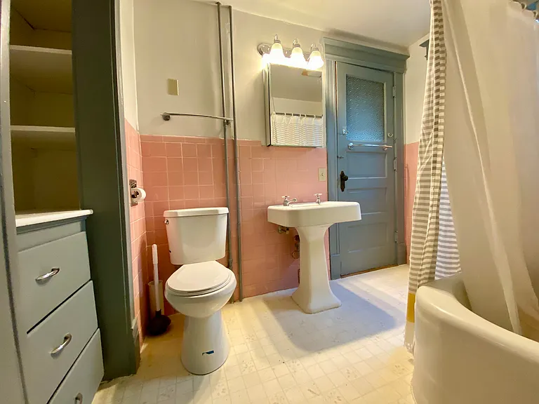 Bathroom with ample storage.